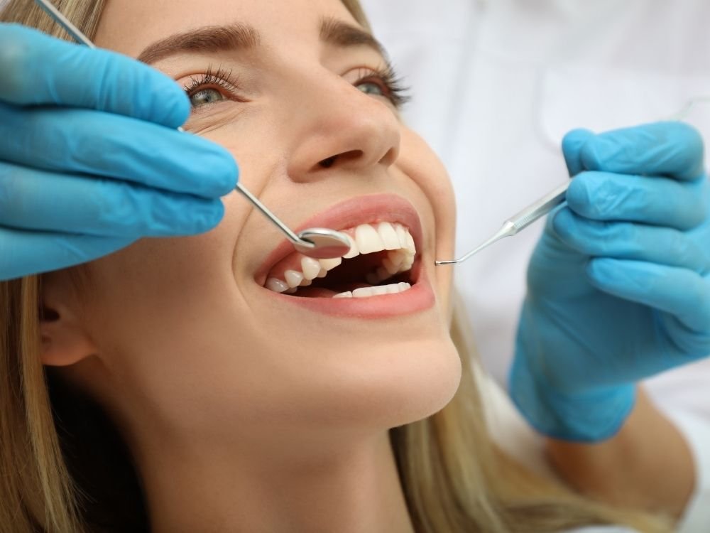 Illustrative clear dental aligner being fitted