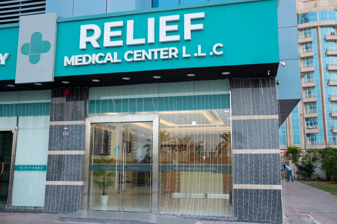 Entrance and exterior signage of Relief Medical Center